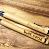 Gepersonaliseerd notitieboekje met gegraveerde houten pen